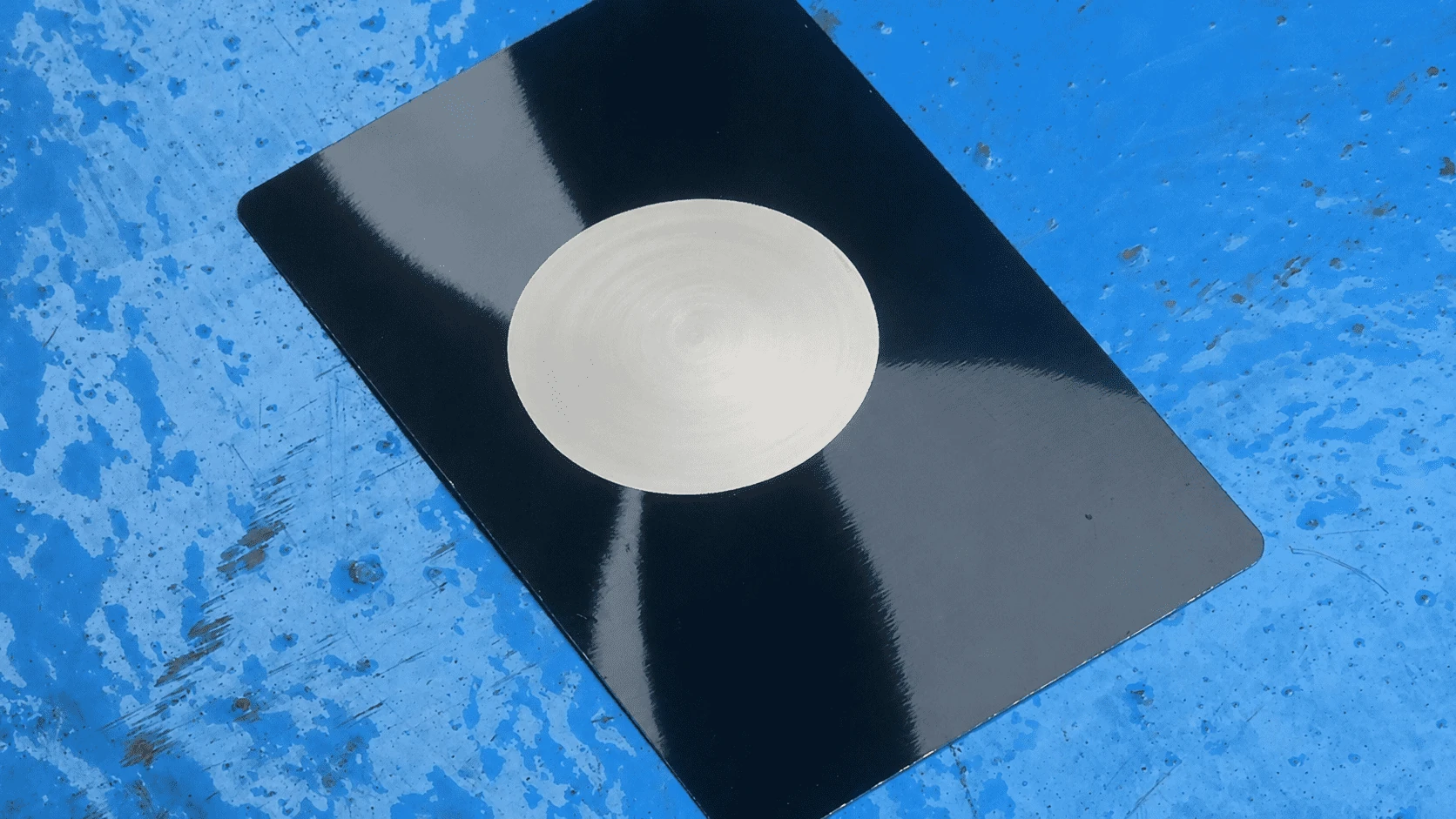 Portable laser cleaner stripping coating from a workpiece